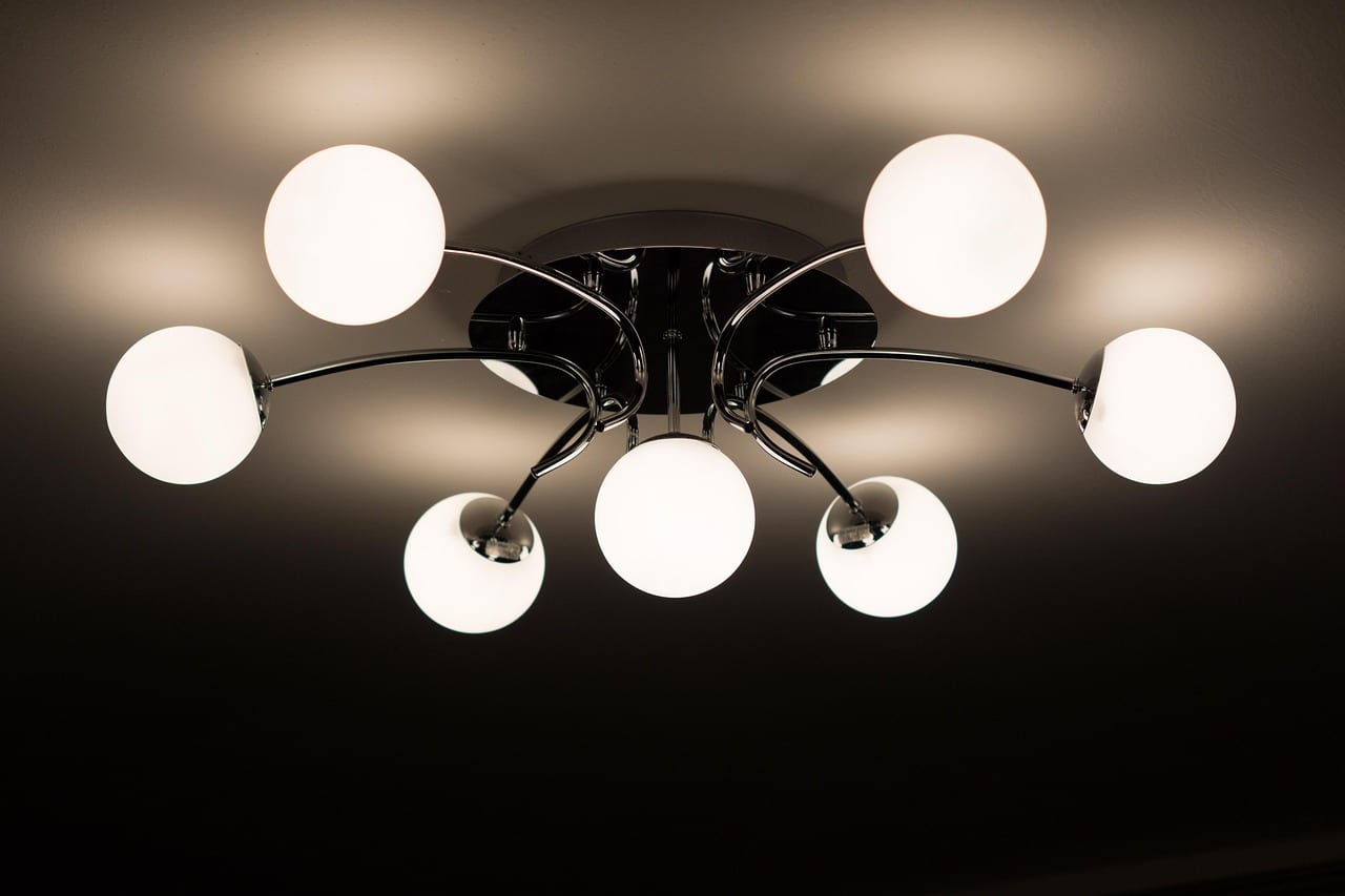 Multiple smart bulbs installed in a ceiling lamp fixture