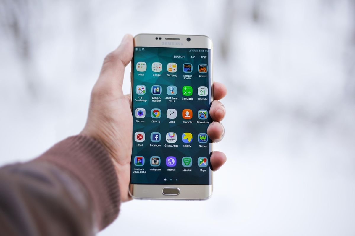 A smartphone home screen showing installed apps