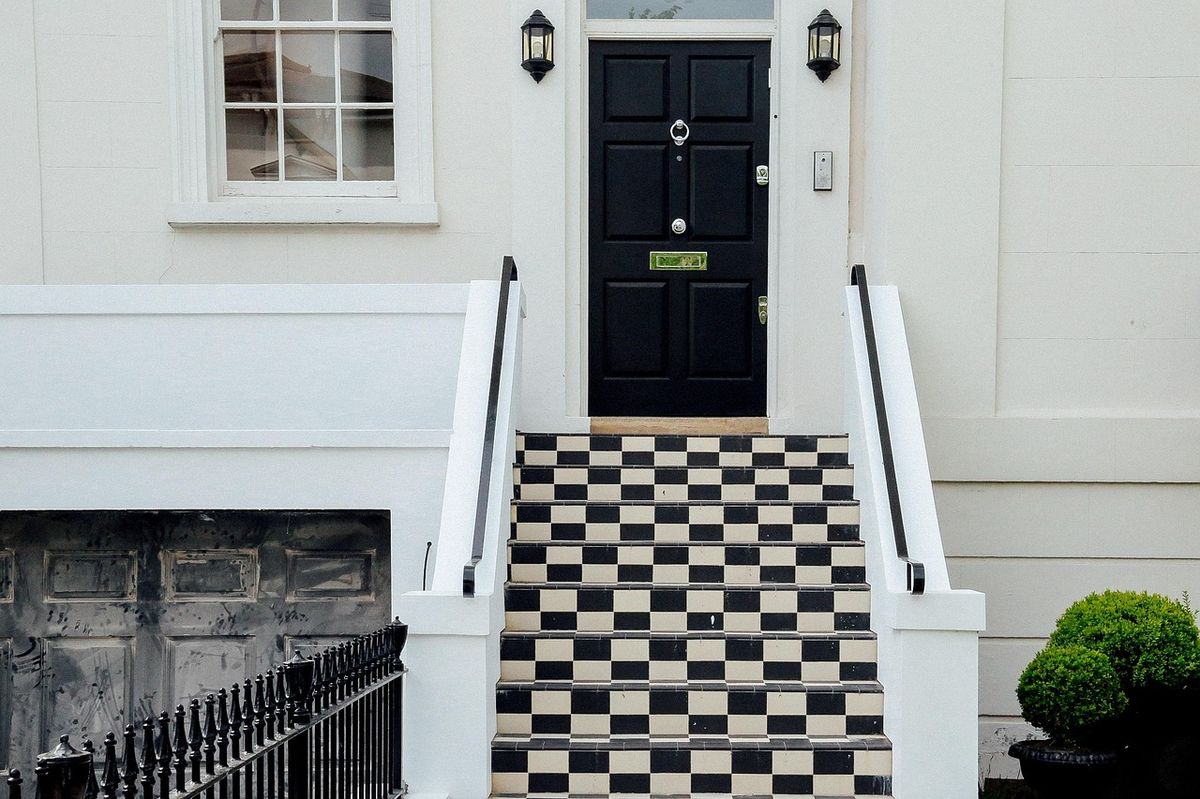 A front door on a house exterior, a typical spot to mount a video doorbell