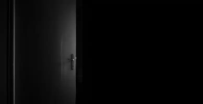 Enhancing the Ring Doorbell 2's Night Vision with Smart Strategies by optimizing the light shining through a black door.