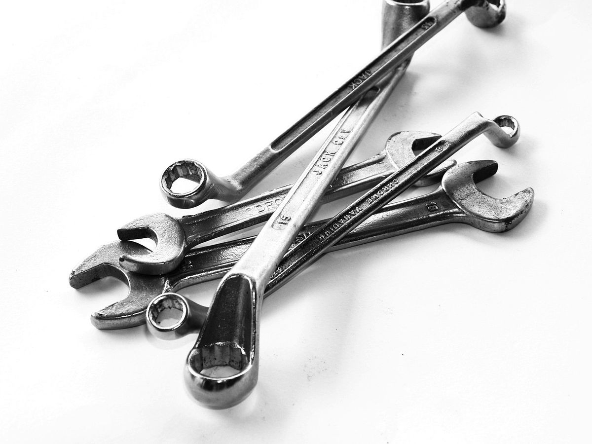 A set of hand tools, similar to what might be used during a DIY security system installation