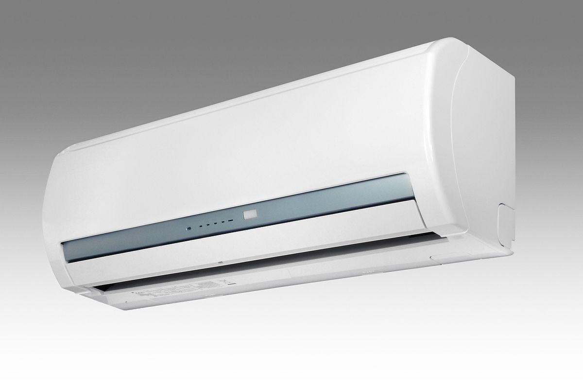 A wall-mounted ductless mini split air conditioning unit